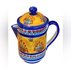 Artisan Ceramic Pitcher with Blue and Yellow Pattern